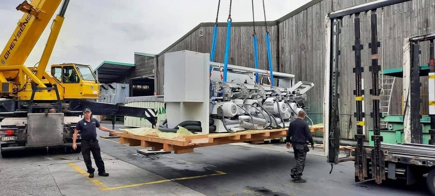 The planing machine being lifted in by crane